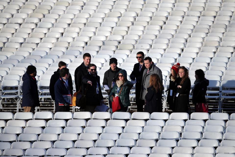 During Sunday's dry run, the stand-in president-elect and vice president-elect waved to rows of empty chairs