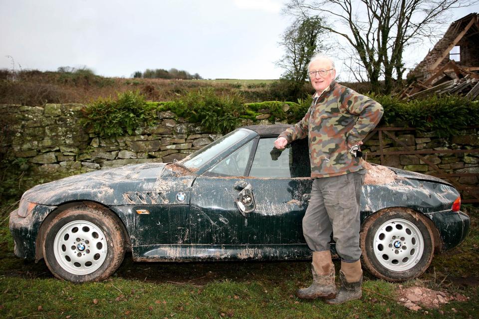  Mr Mellors' BMW is looking worse for wear after his barn was brought down in the freak tornado