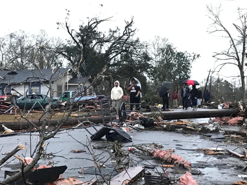 Trees and debris cover the ground after a tornado tornado ripped through the Hattiesburg, Mississippi