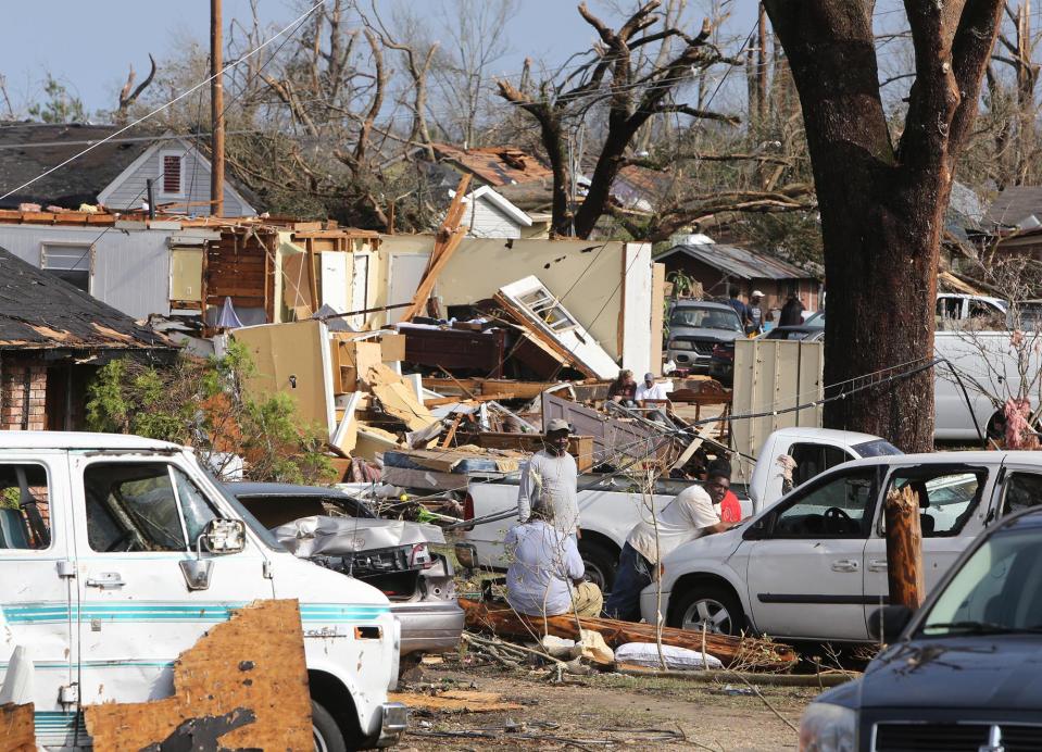 At least four people were killed when the apparent tornado ripped through the town on Saturday