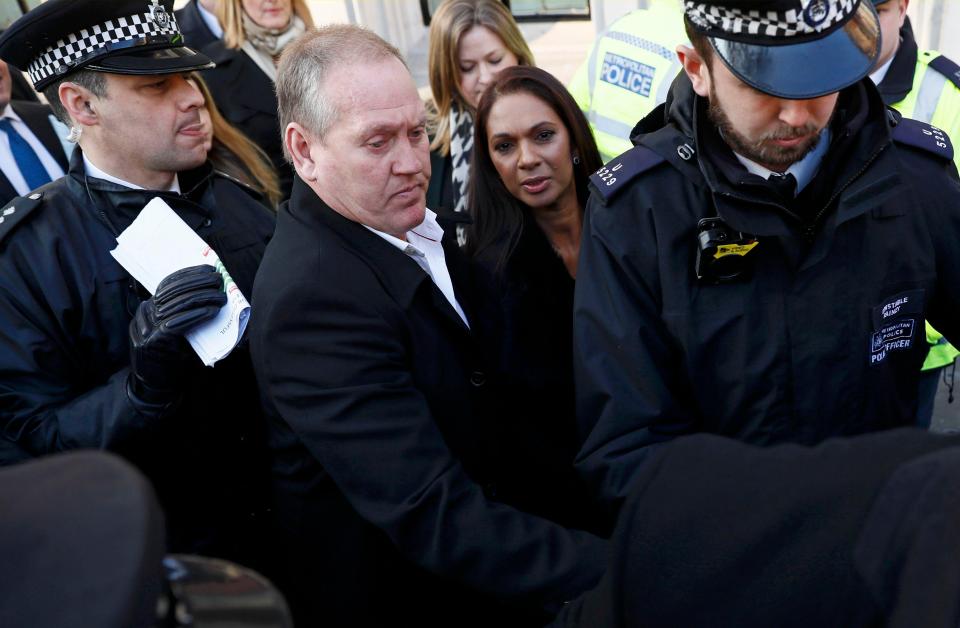  Pictured leaving the Supreme Court, Ms Miller had to be protected by police