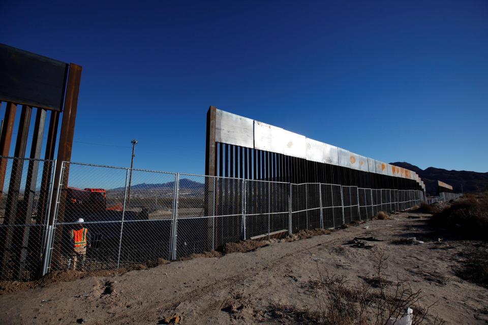  A newly-built border wall on the Mexico-US frontier. The 2,000-mile border looks set to be locked down with a huge wall after Trump confirmed he would begin the process 'immediately'