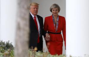 Donald Trump only held Theresa May's hand 'because President has chronic fear of slopes'