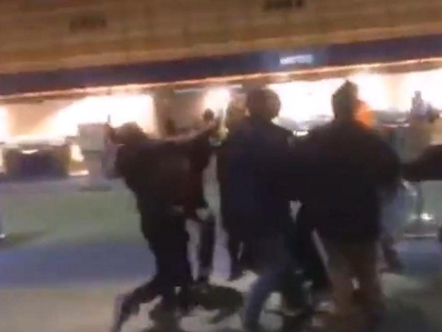 Shocking footage shows the moment a Donald Trump supporter was knocked unconscious by a “Muslim ban” protester 