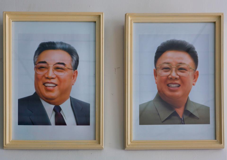The murdered playboy's grandfather Kim Il Sung (left) and Kim Jong Il (right)