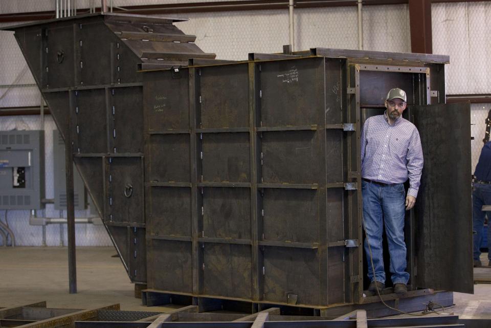 Gary Lynch with a shelter that could one day harbour some of humanity's last survivors