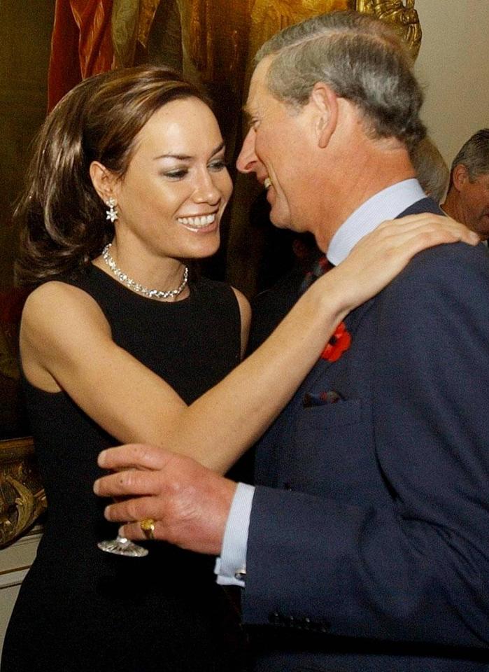 Tara shares a tender moment with Prince Charles at a breast cancer awareness event at Clarence House in 2003