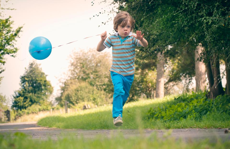 Tie a balloon to your child’s wrist so you can spot them more easily in busy places like the beach