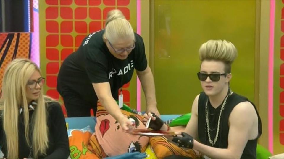 She swiped the plate and the lines of sugar from Jedward