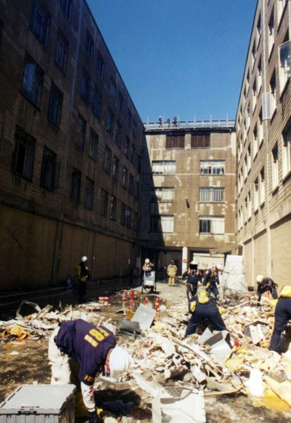  FBI agents trawl though the debris left behind after the attack