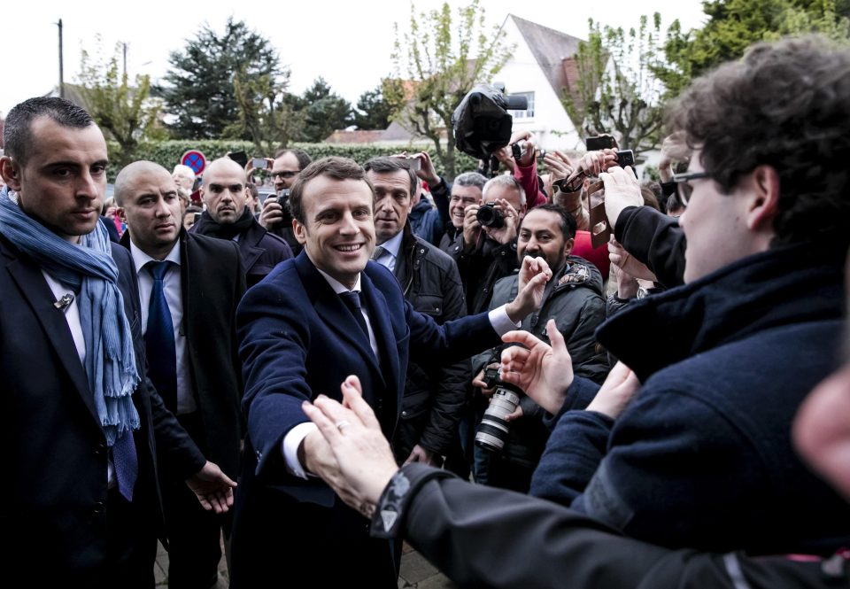  Hundreds of supporters waited outside as Macron went to vote himself at a town hall in Le Touquet-Paris-Plage, France