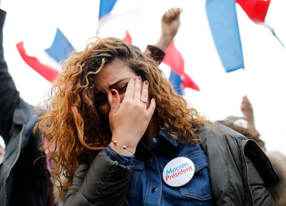  One of Macron's fans is overcome with emotion following his explosive election win