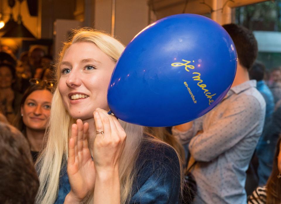 This blonde woman was one of many people rejoicing at the Square Pig pub which staged a French Election