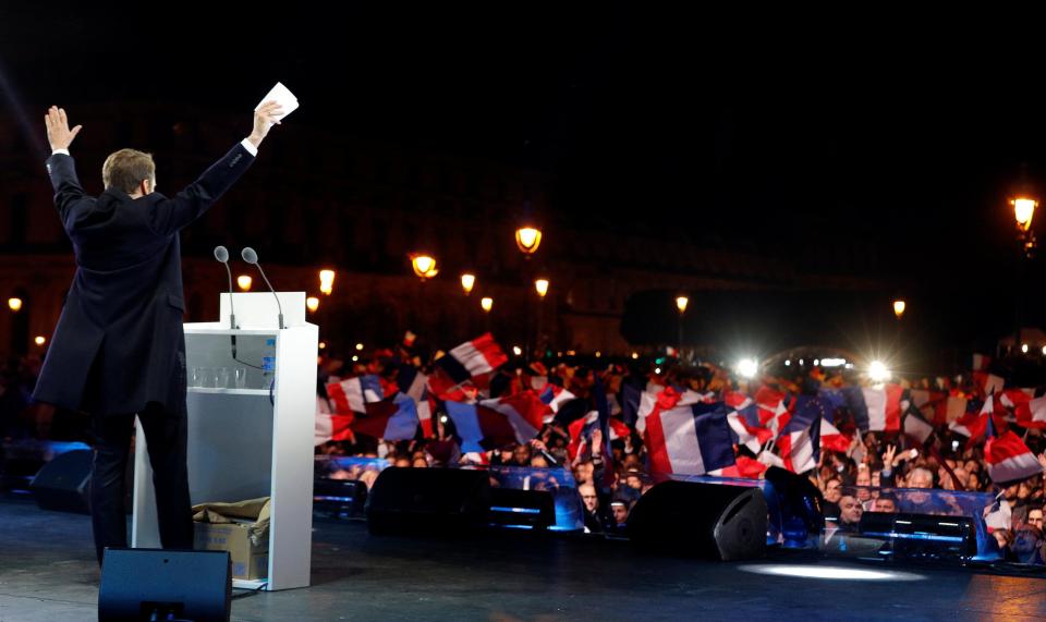  The jubilant leader of En Marche! salutes the huge crowd gathered in central Paris