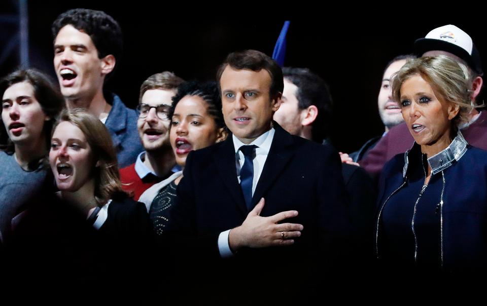  The new President sings the French national anthem alongside his wife and supporters