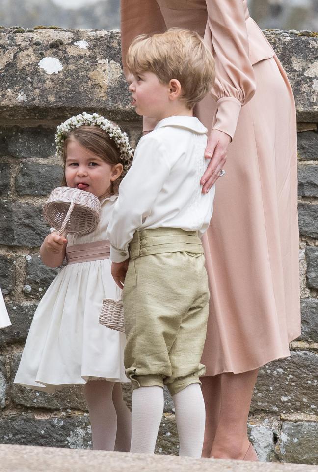  Princess Charlotte and Prince George look ready to head to the reception as they wait for the bride and groom outside church