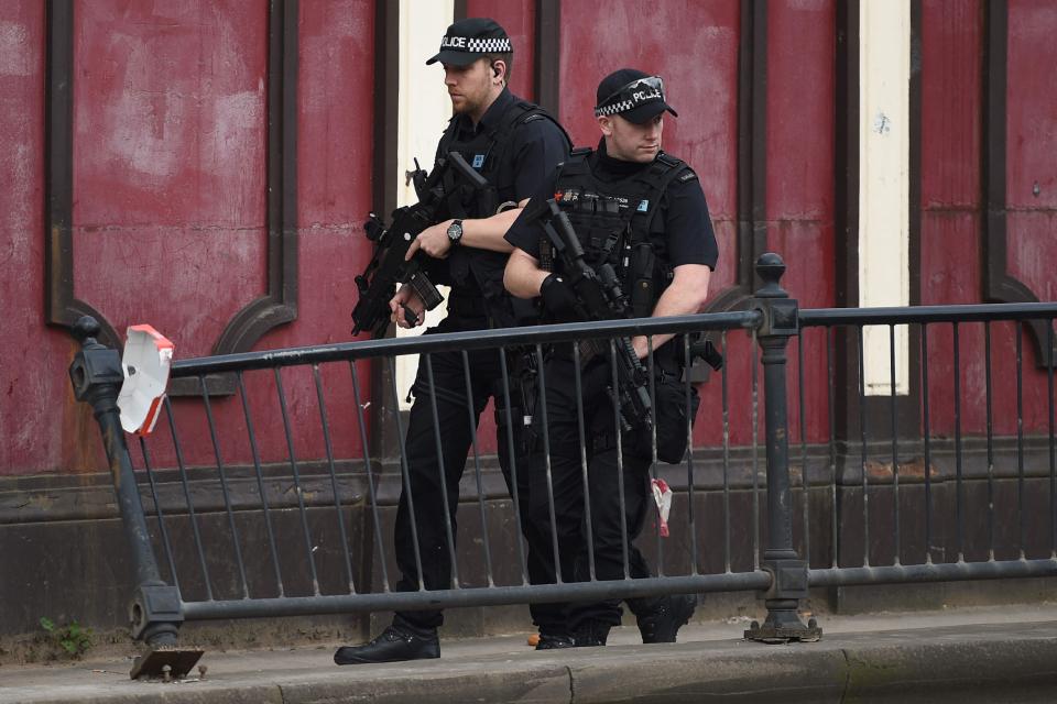  Gun cops patrol Manchester streets as security is tightened following the bombing