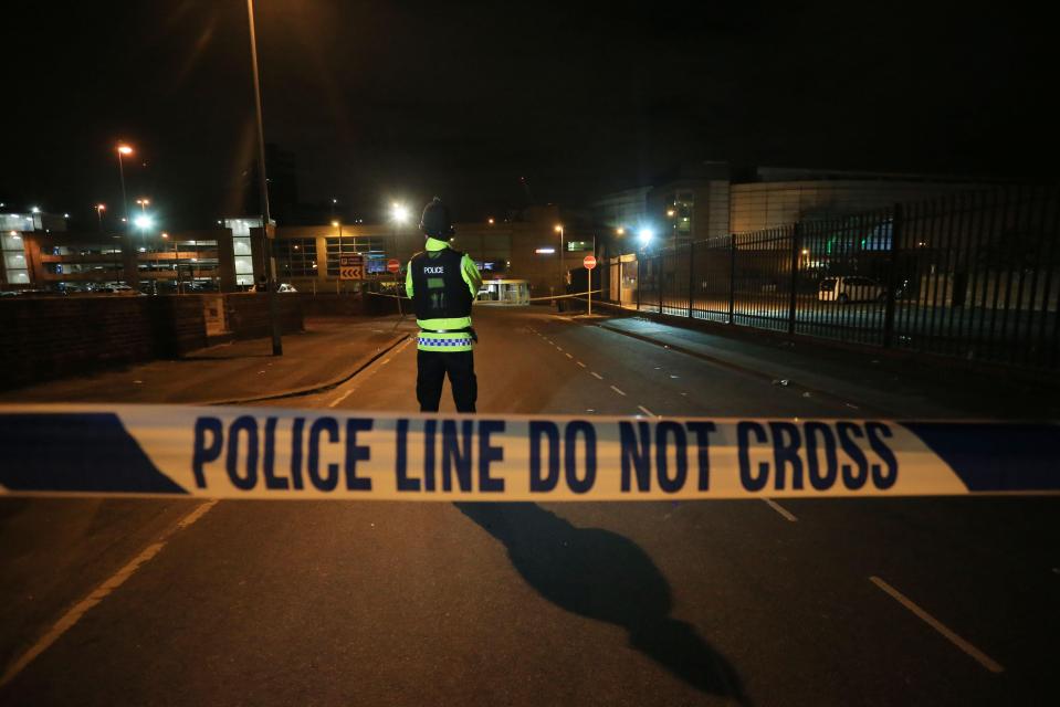  Police guard the entrance to the Manchester Arena where the attack took place