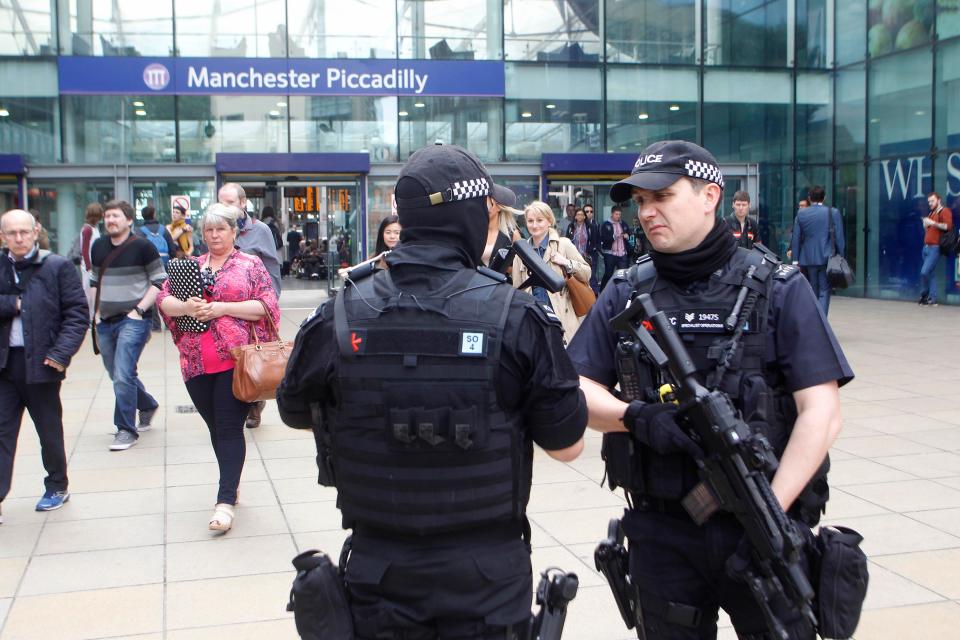 Cops armed with guns were sent to major transport hubs across the country, including Manchester Piccadilly station 