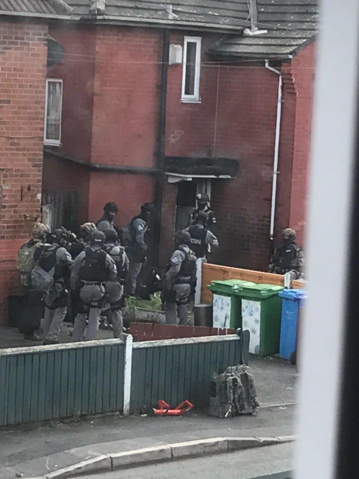  Officers raided the house of the suicide bomber after blowing the door from its hinges