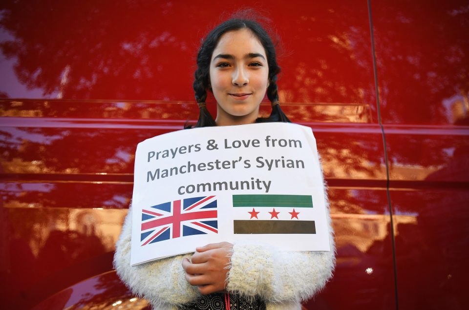 A member of Manchester's Syrian community shows solidarity with their fellow city dwellers