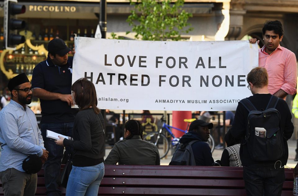 Members of the Muslim community attend the vigil