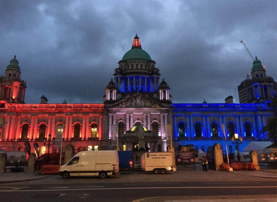 Belfast City hall lit up in respect for those killed and hurt in Manchester