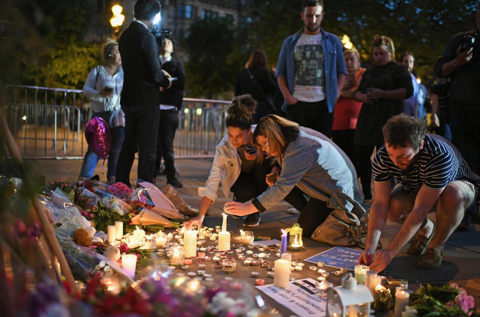  Some leave written messages of support and remembrance