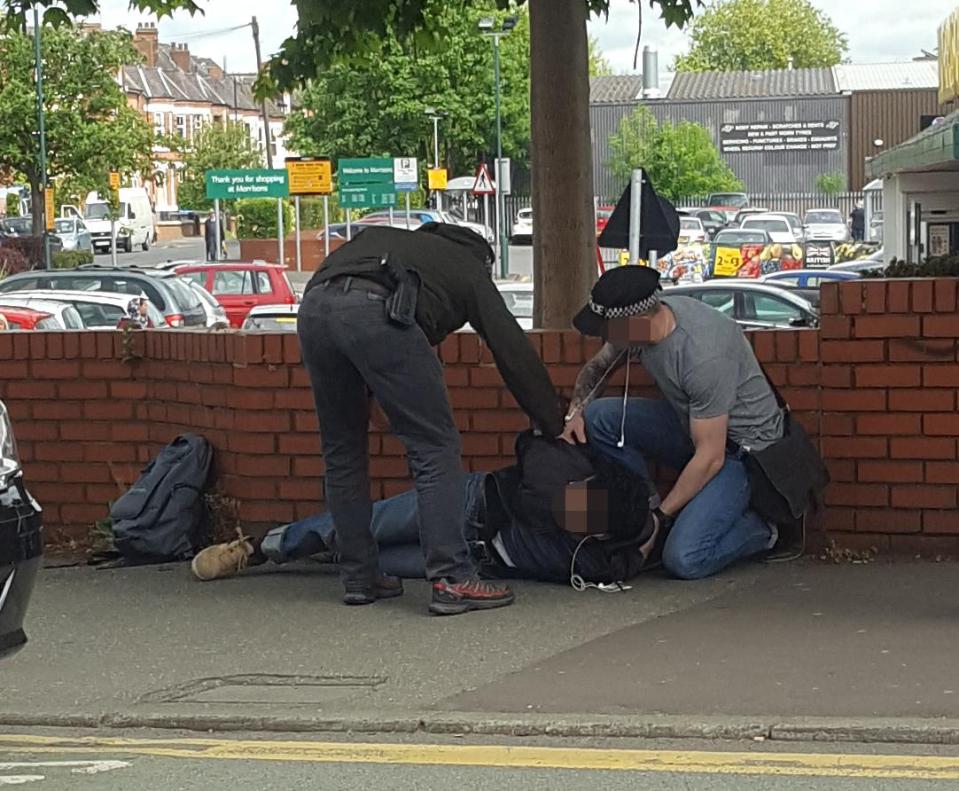  Police pictured arresting Ismail - the bomber's brother - yesterday