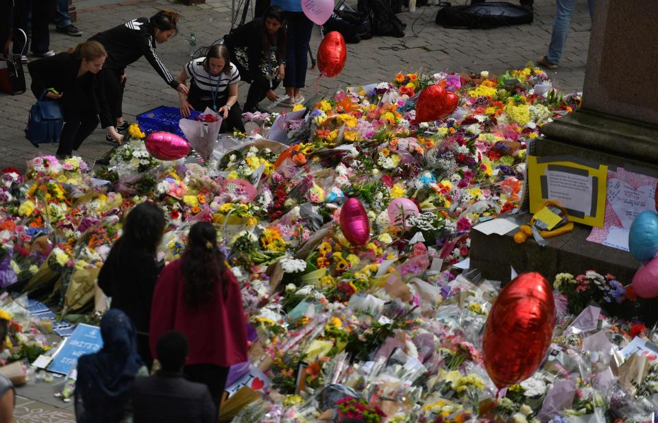 Thousands of well-wishers have left tributes to the dead in Manchester