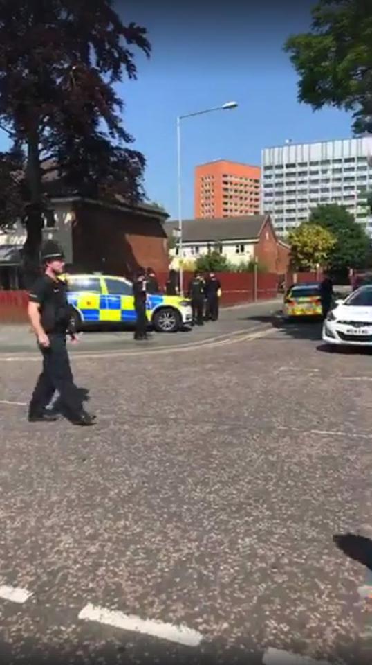  Armed cops and the Army were scrambled to the Hulme area of Manchester this morning