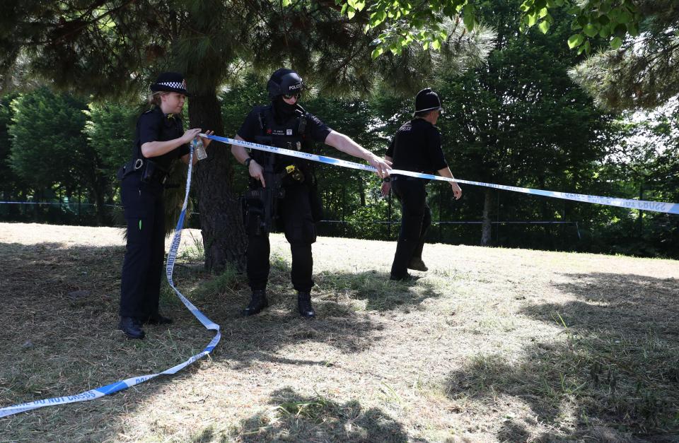  Cops set up a cordon in the Hulme area of Manchester but this has now been removed