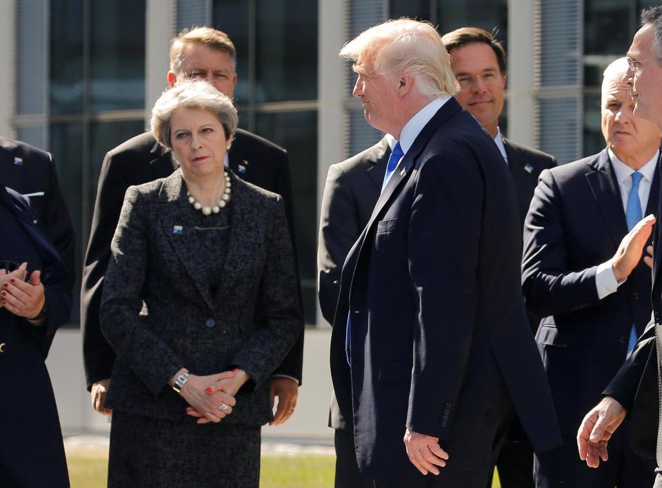Theresa May and Donald Trump at the summit where she warned him to stop the leaks