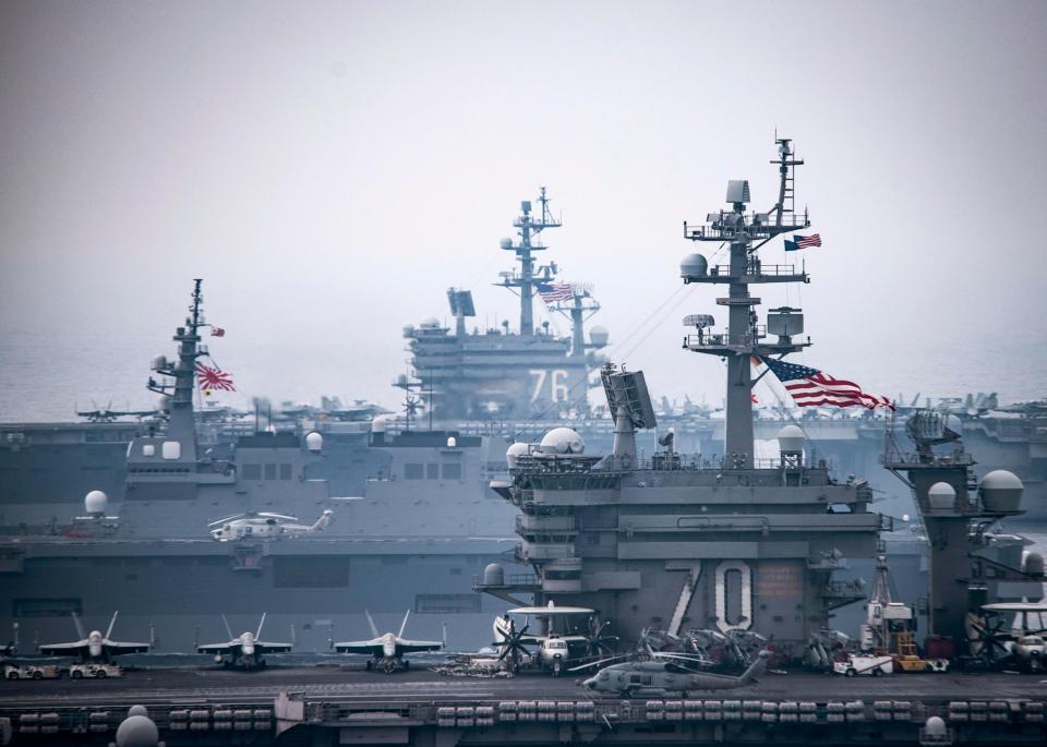This amazing photograph shows the bridges of the massive supercarriers 