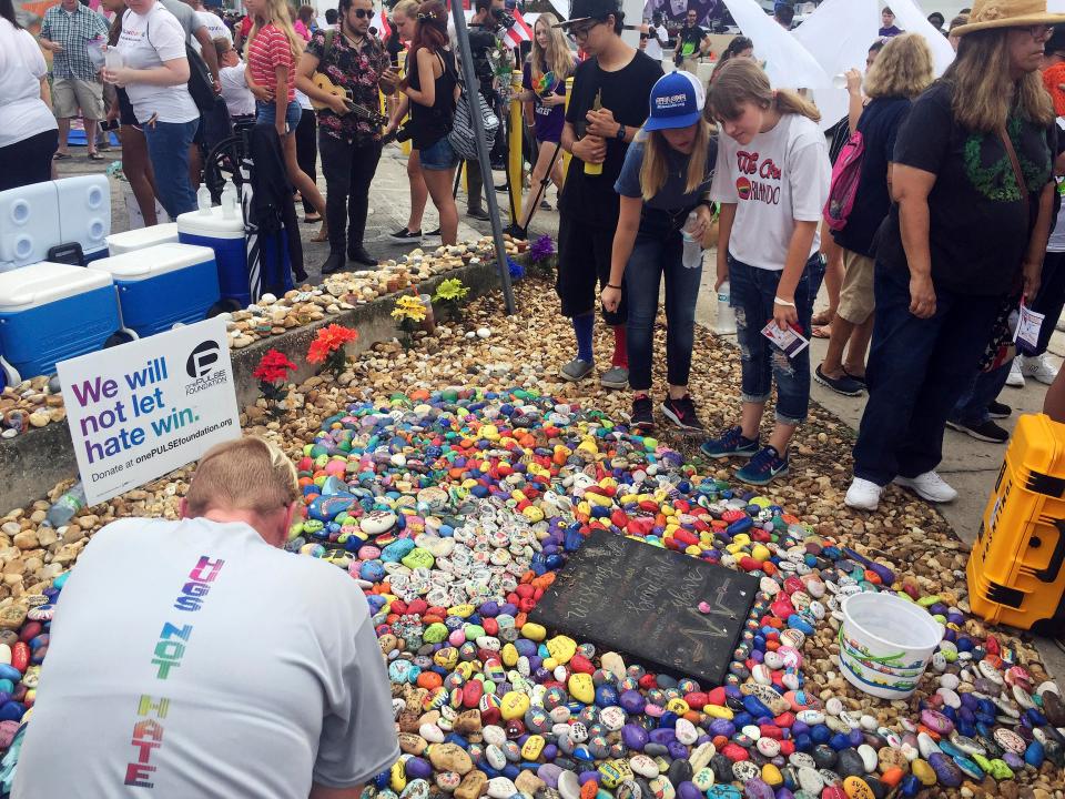 The makeshift memorial saw flowers laid across the ground