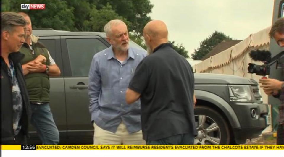 Corbyn was seen chatting to festival founder Michael Eavis earlier today