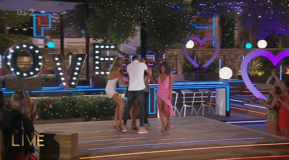  Grabbing the side of his head, Chris gave Kem an enormous kiss