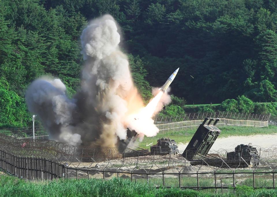  A US M270 Multiple Launch Rocket System firing a test missile from South Korea's east coast