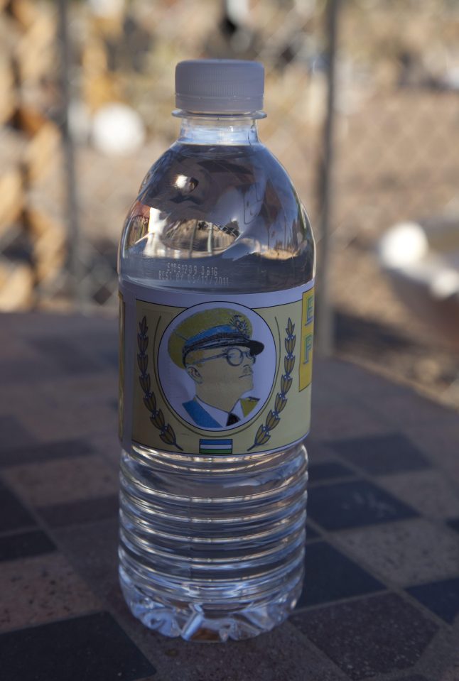 A bottle of Molossian water. Baugh admits the nation is heavily dependent on imports