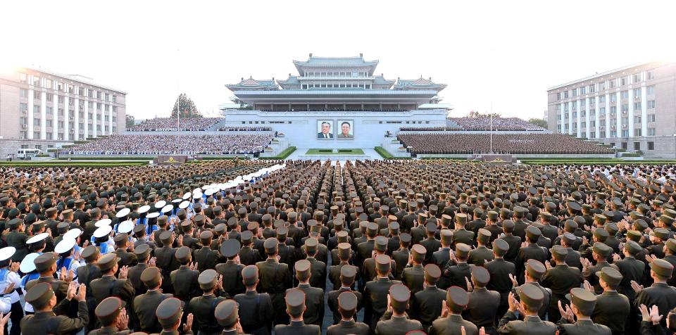 Army personnel and people gather at Kim Il Sung Square in Pyongyang to celebrate the successful test-launch of intercontinental ballistic rocket Hwasong-14