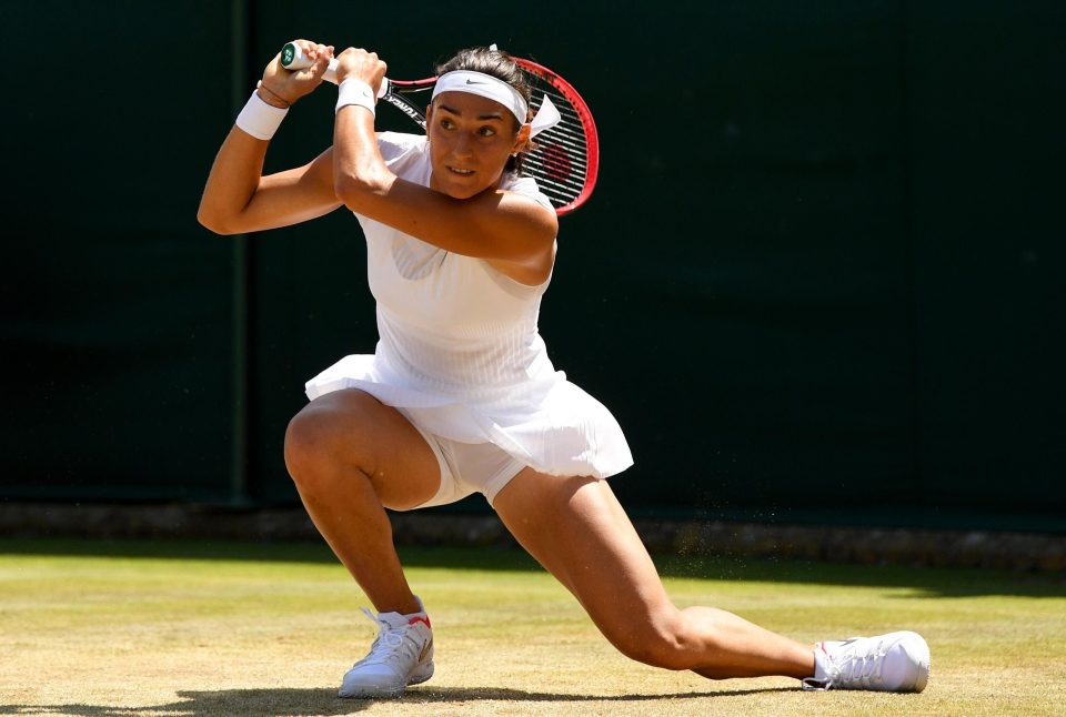 Every single picture I’ve seen from Wimbledon this year is of one of the girls either bending over or with her legs at the angle of a set square as she stretches to return a tricky shot, like this one of Caroline Garcia of France