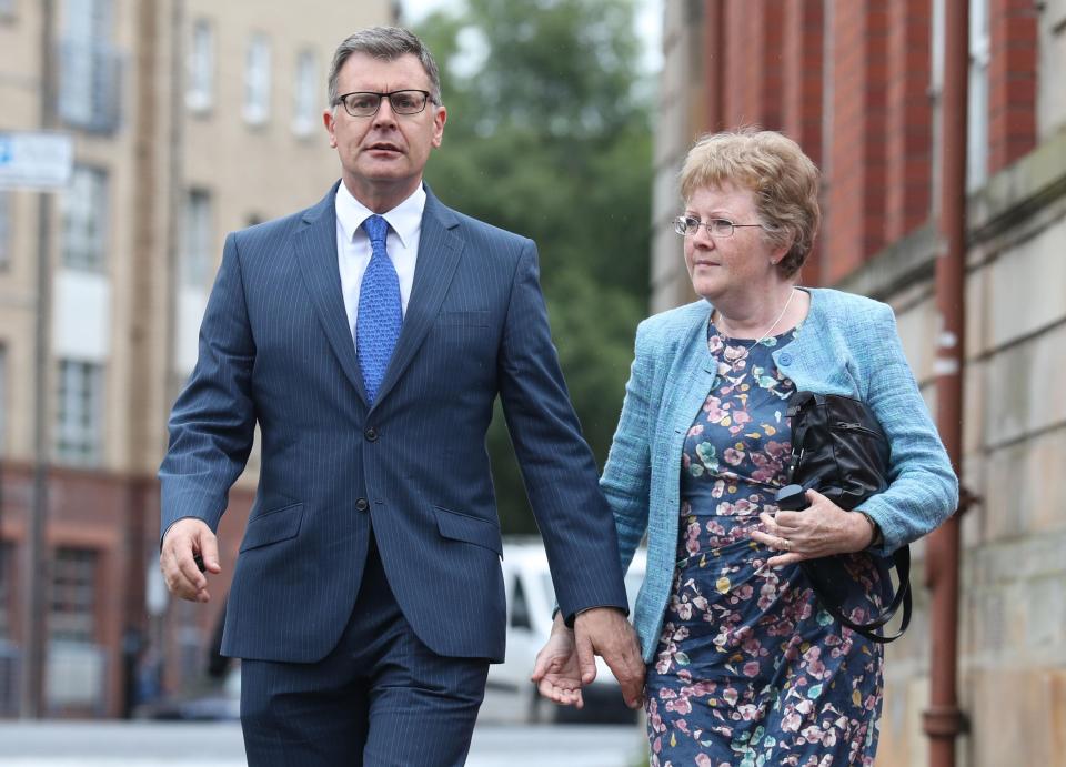 David and Cathy Logan, the parents of Cameron and Blair Logan, arrive at the High Court in Glasgow