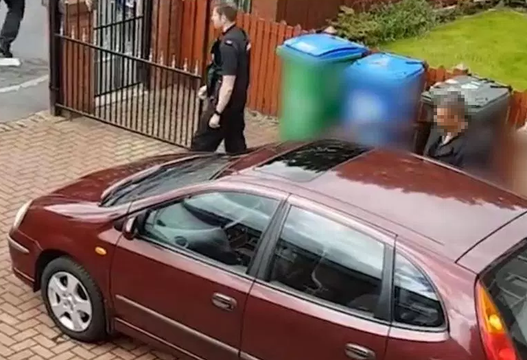  A man, believed to be taxi driver Huk, was also filmed driving away in a brown Nissan car