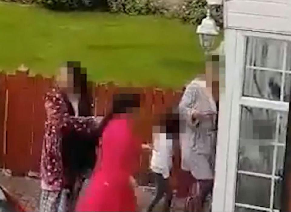  She branded one woman a 'bitch' before she was pulled in by a woman – believed to be Huk’s wife – who also shouted at the bystanders