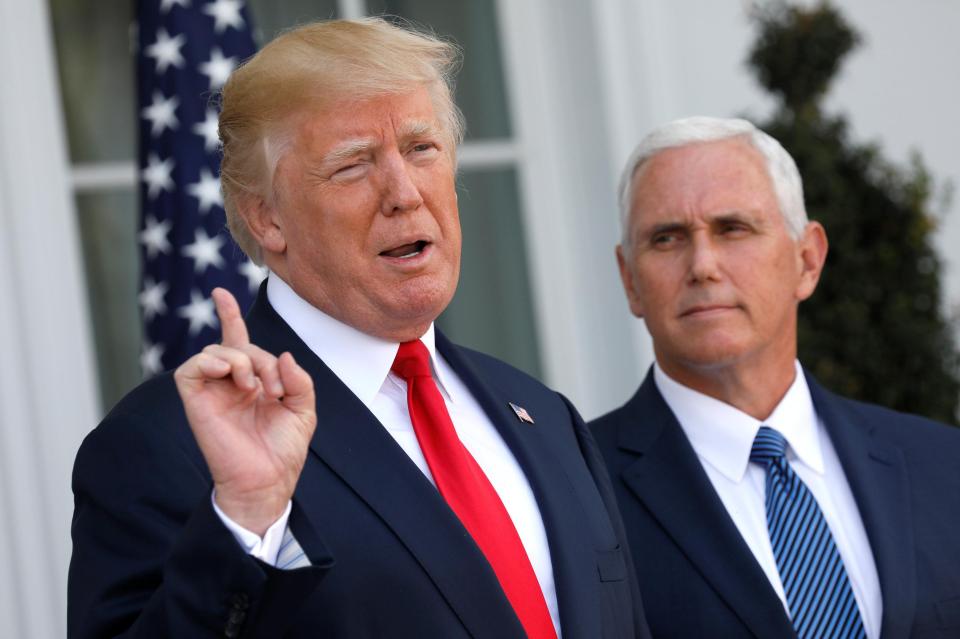  Trump with Vice President Mike Pence at Trump National Golf Club. The President threatened to take an even tougher line with North Korea