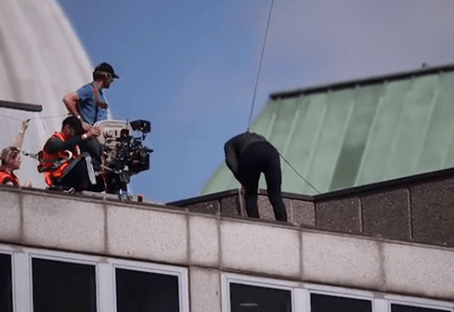  The actor staggers away and grabs his knee