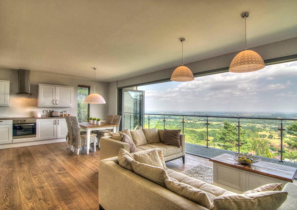 This two-bedroom house has panoramic views over the surrounding countryside. 