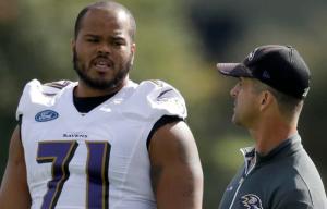 Jermaine Eluemunor with Baltimore Ravens head coach John Harbaugh this week in training