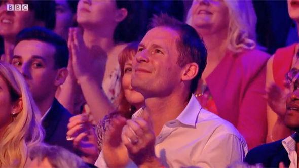  Mark applauds the couple's first routine