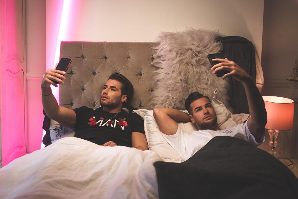  The video starts with them lying in bed together